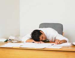 Businessman sleeping at desk