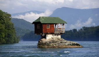 A house built on a rock on the river Drina is seen near the western Serbian town of Bajina Basta